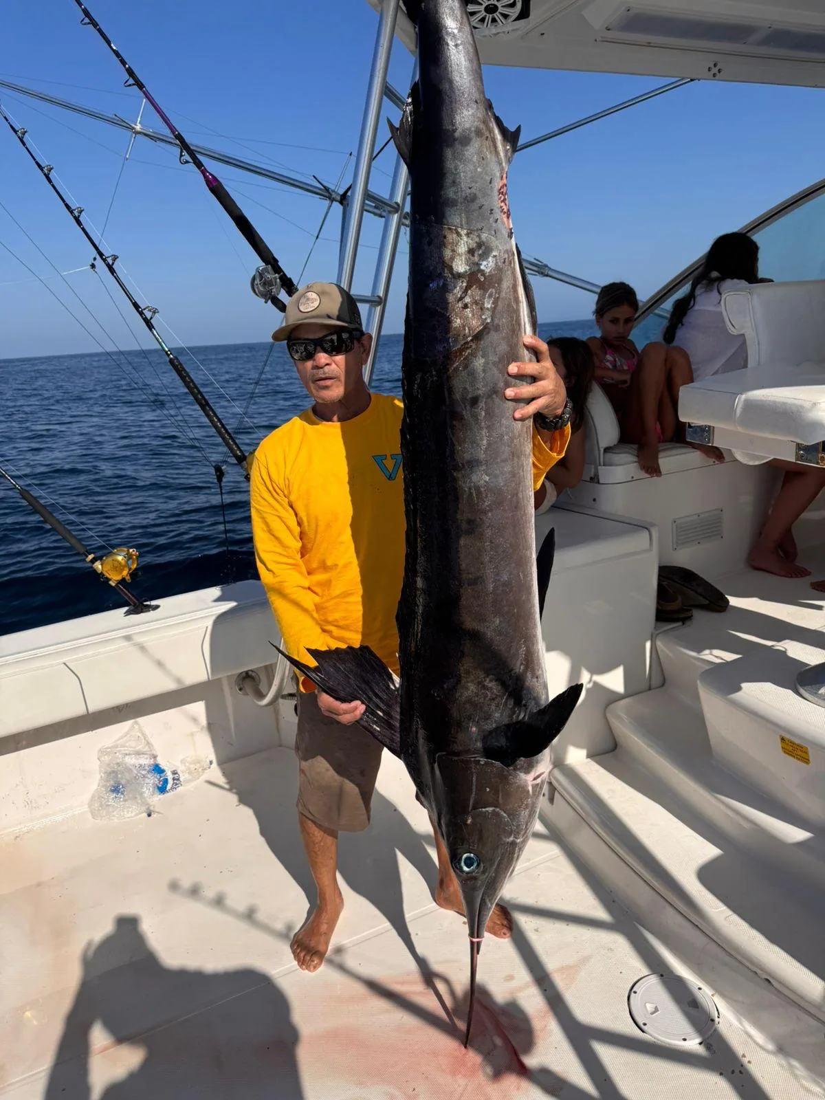 Angler fighting a roosterfish inside Banderas Bay